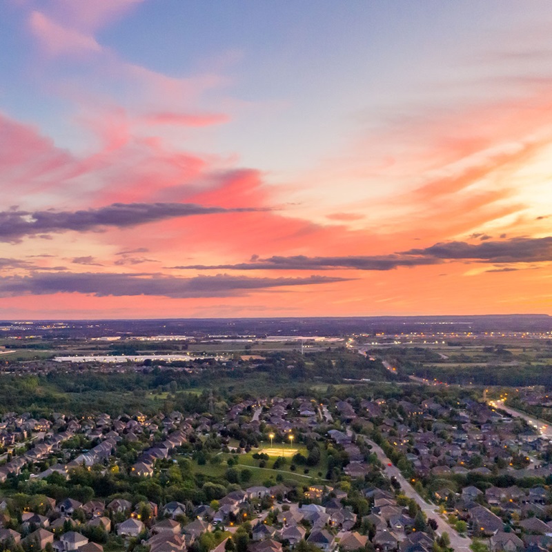 Sunset over suburban area